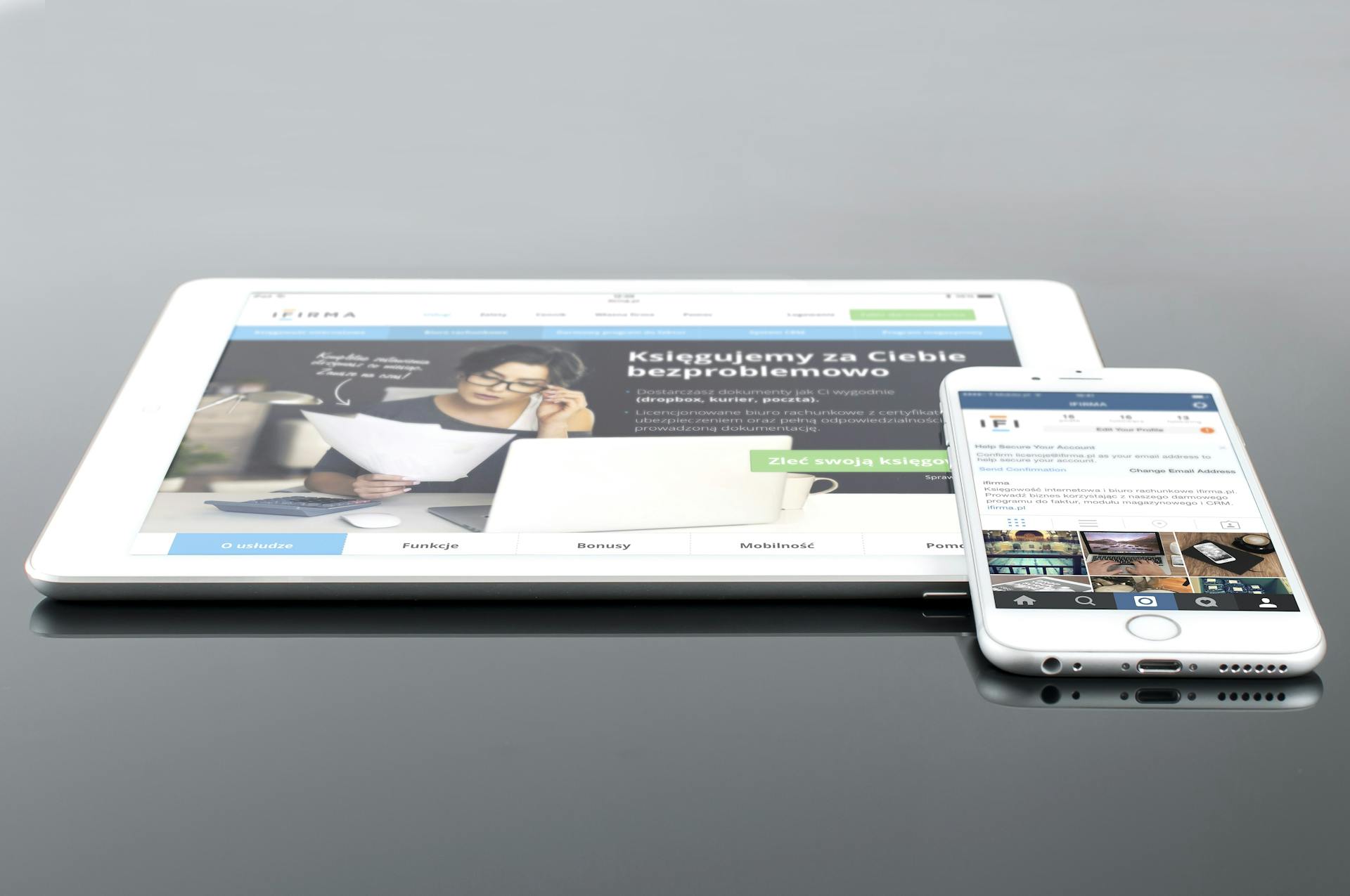 Tablet and smartphone showing the same website on different screen sizes—representing the importance of mobile optimization and responsive design in ecommerce conversion rate optimization.