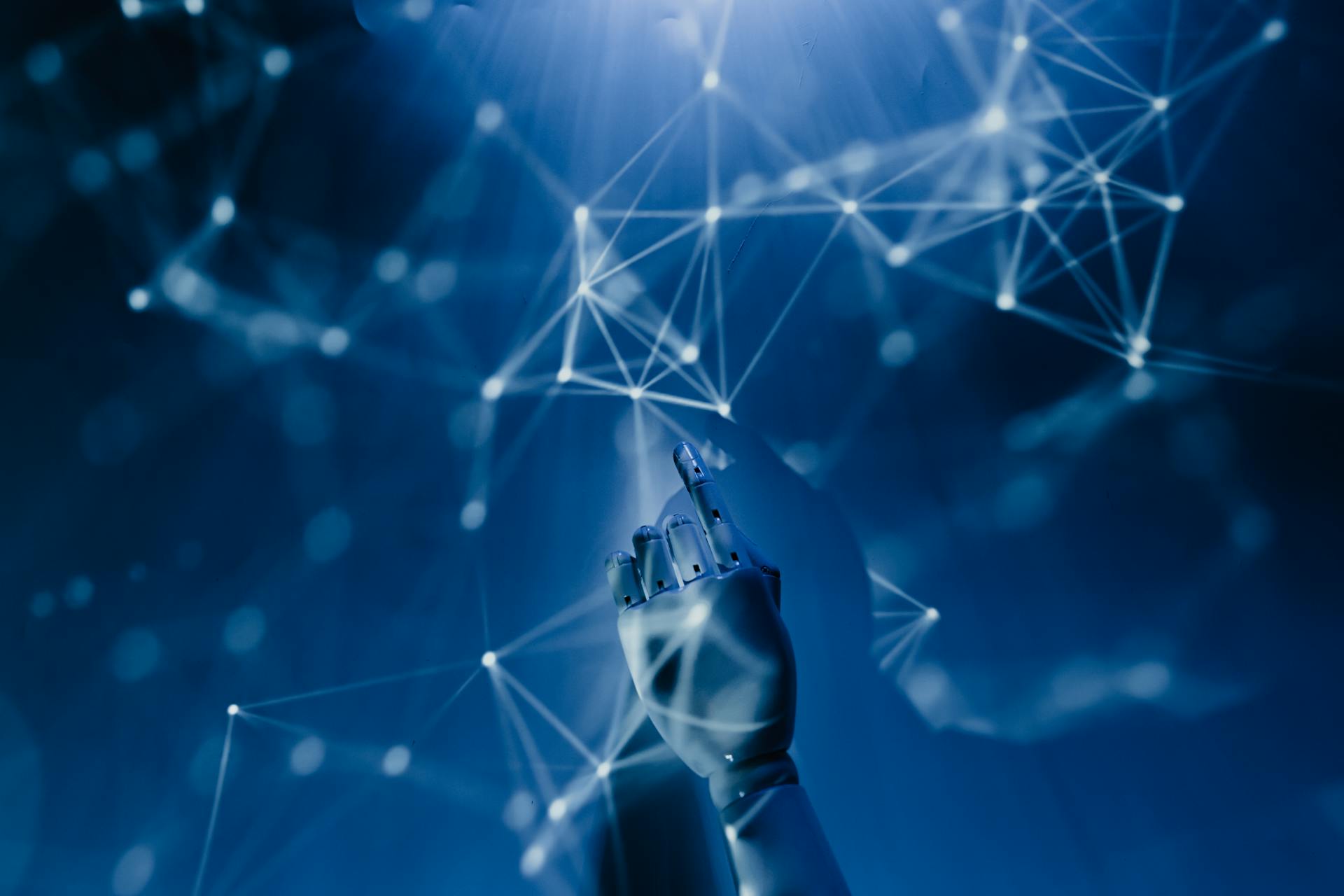 Robotic hand interacting with digital network interface, symbolizing AI-powered customer service automation and machine learning in ecommerce support systems.