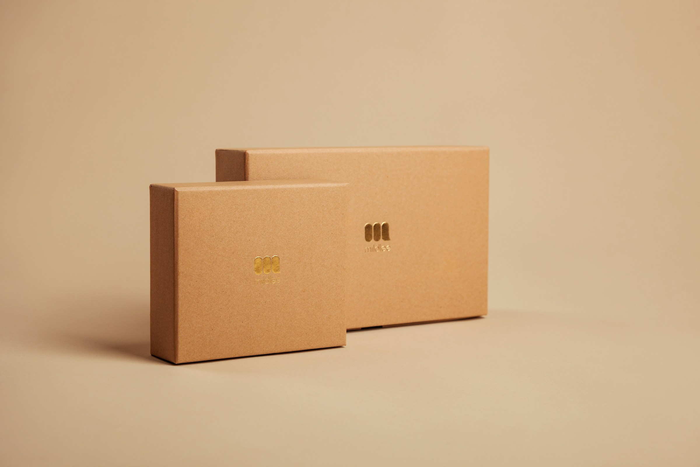 Minimalist eco-friendly ecommerce packaging boxes made of recyclable cardboard, representing sustainable packaging materials for ecommerce shipping and order fulfillment.