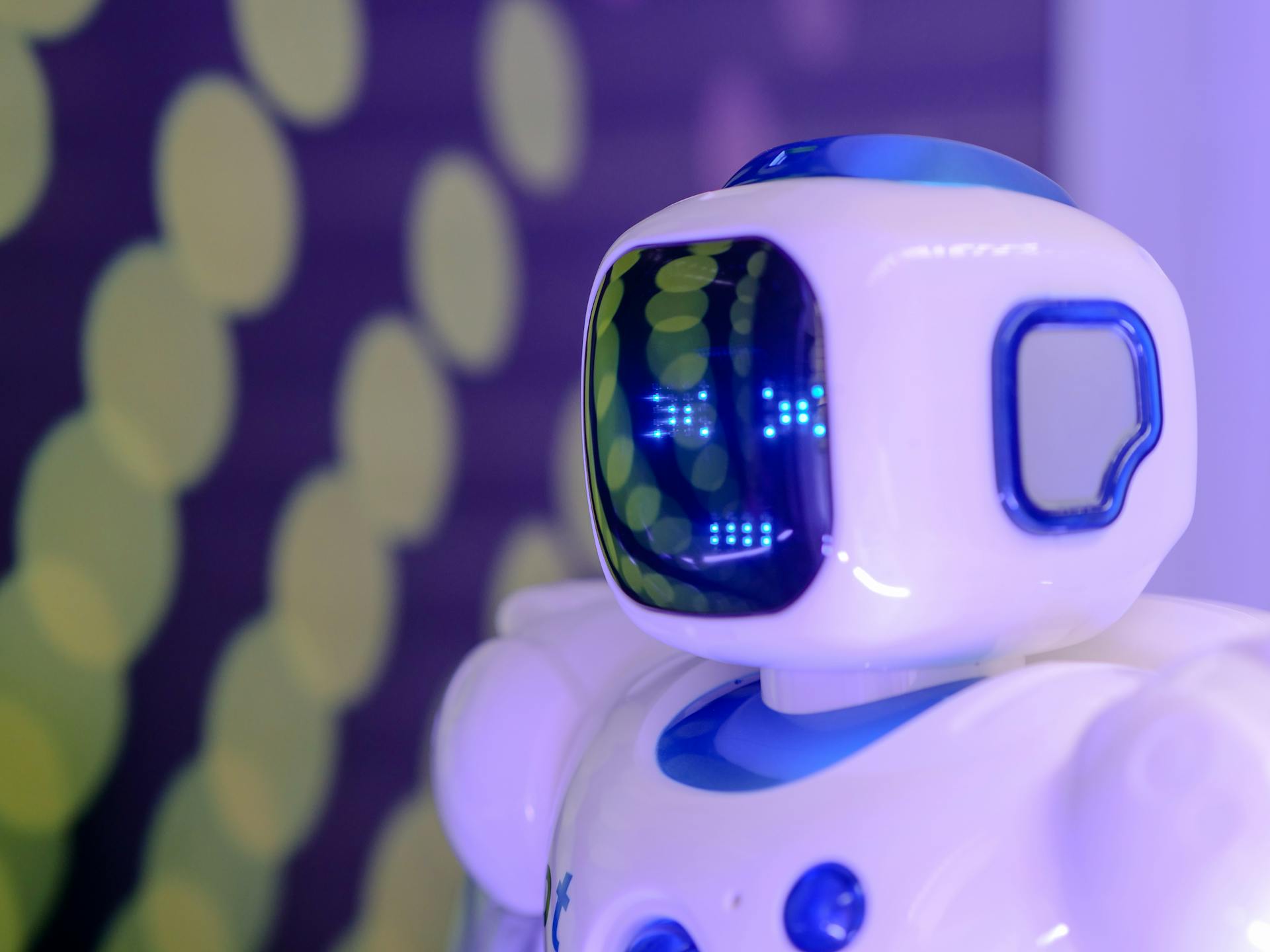 Close-up of a futuristic AI robot representing customer service automation and chatbot technology in ecommerce support.